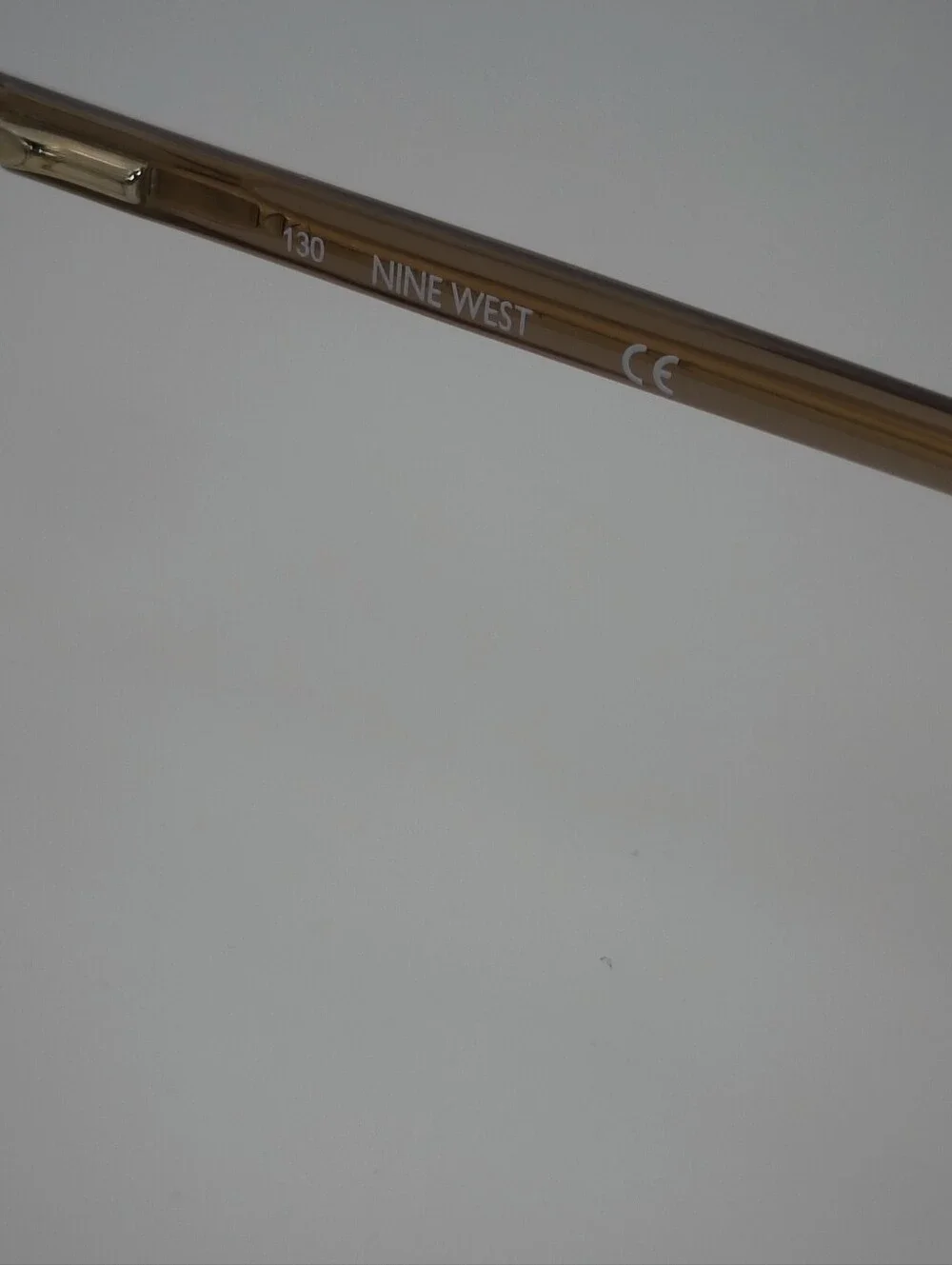 Nine West NW5152 Taupe Cat-Eye Eyeglass Frames with Pearl Accent.
